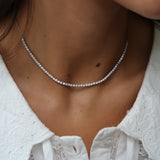Half-Tennis Necklace with Emerald Cut Diamond Pendant