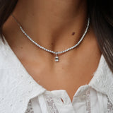 Half-Tennis Necklace with Emerald Cut Diamond Pendant